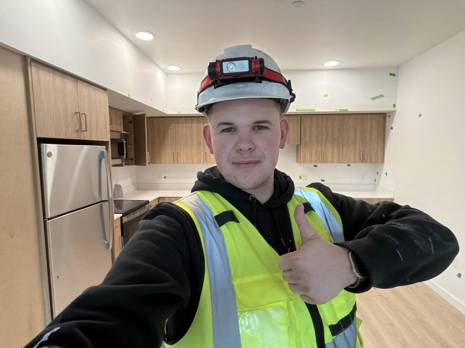 Sim, owner of KRYV BUILT, on site at a finished kitchen