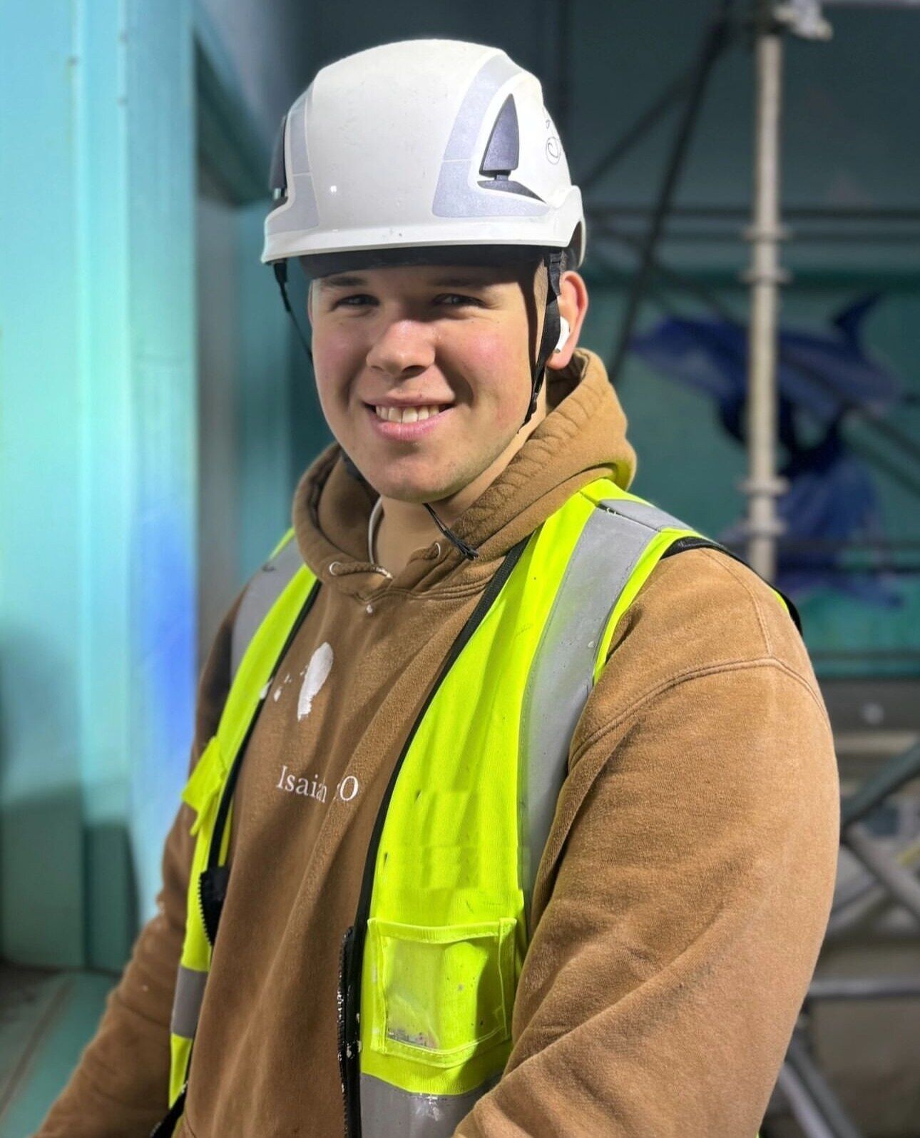 Sim, owner of KRYV BUILT, on a commercial site